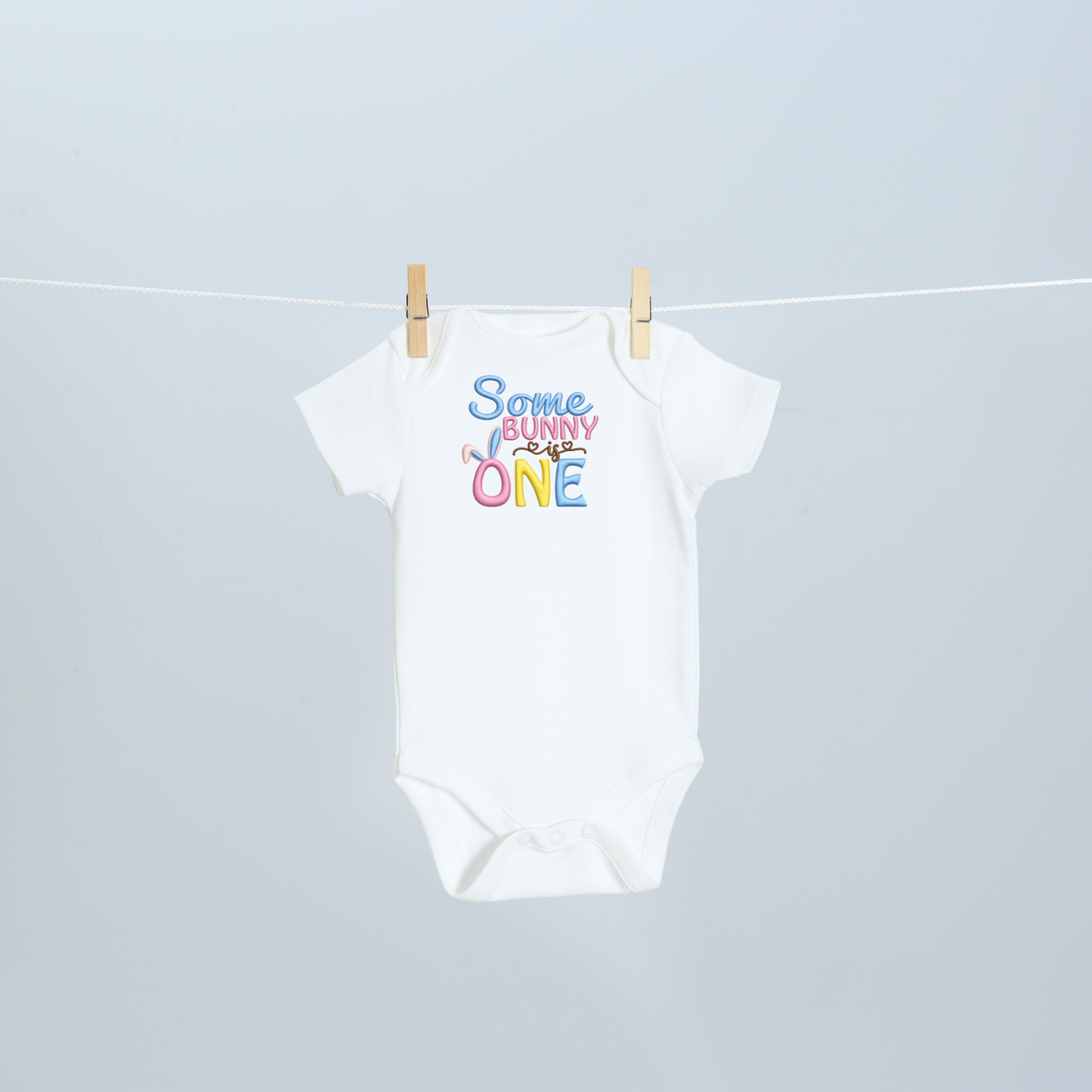 Some Bunny Is One Embroidered First Birthday Bodysuit