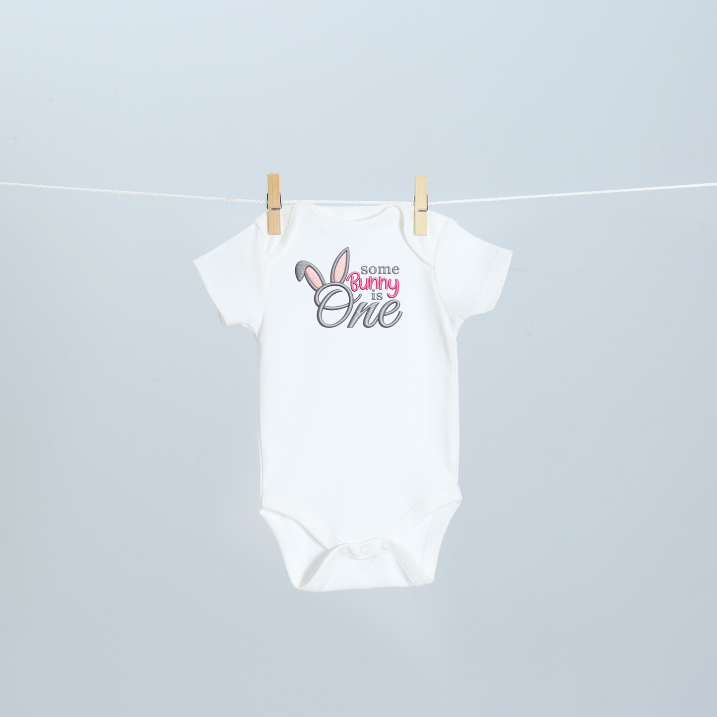 Some Bunny Is One Embroidered First Birthday Bodysuit